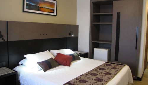 Habitación superior con 1 cama doble o 2 individuales
