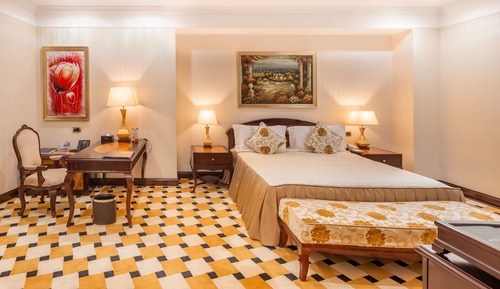 Suite ejecutiva, varias camas