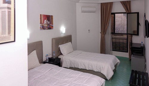Habitación Confort con 1 cama doble o 2 individuales