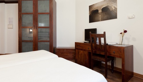 Habitación estándar con 1 cama doble o 2 individuales