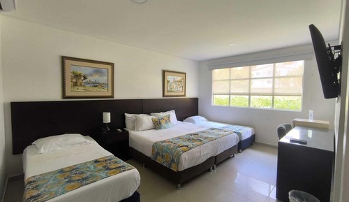 Habitacion Cuádruple, 1 Cama King Size, 2 Camas Individuales