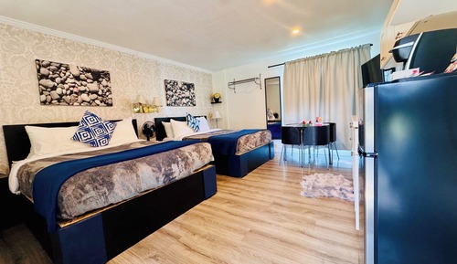 Habitación estándar, 2 camas de matrimonio, patio, vistas a la piscina