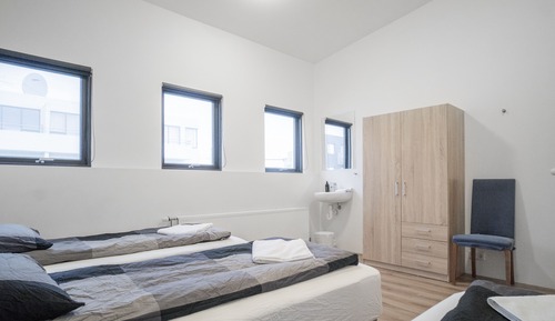 Habitación triple, baño compartido