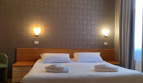 Habitación Confort con 1 cama doble o 2 individuales