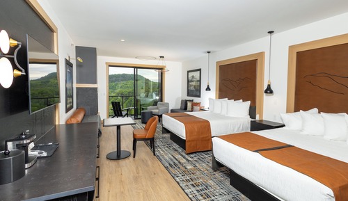 Estudio Elite, varias camas, chimenea, vistas parciales al lago