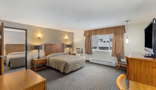 Suite Deluxe, 2 camas de matrimonio, Aire acondicionado