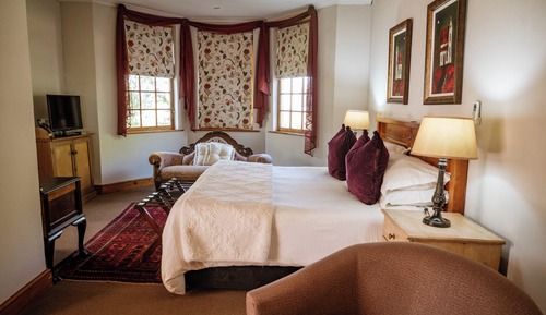 Habitación de lujo con 1 cama doble o 2 individuales, vistas al jardín