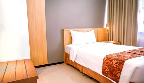 Suite junior, varias camas