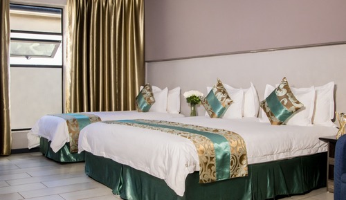 Habitación triple Deluxe, vistas al jardín