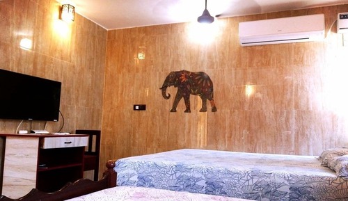 Habitación cuádruple Deluxe