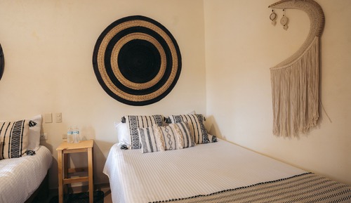 Habitación junior, varias camas, cocina básica
