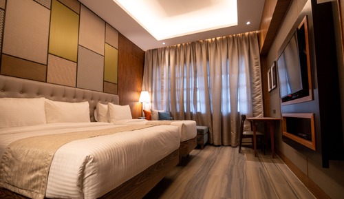 Habitación cuádruple Deluxe, varias camas