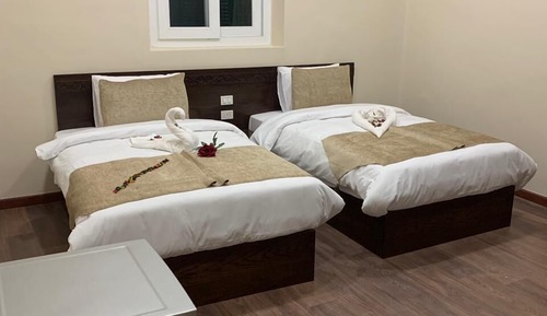 Habitación junior con 1 cama doble o 2 individuales