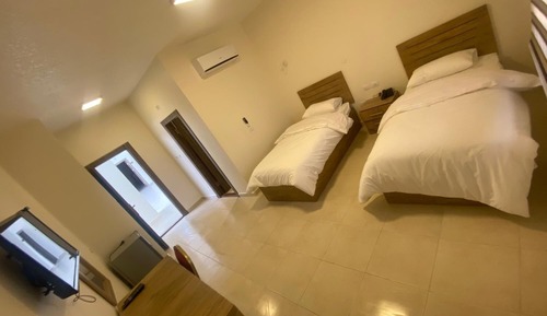 Habitación con 2 camas individuales