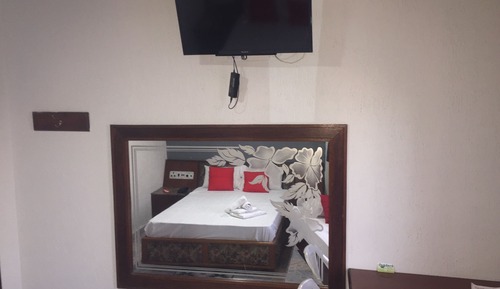 Habitación triple, varias camas