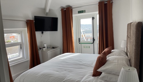 Habitación Confort con 1 cama doble o 2 individuales, vistas parciales al mar