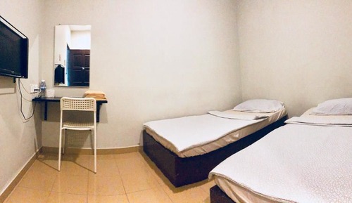 Habitación con 2 camas individuales