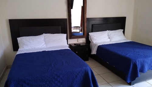 Habitación cuádruple estándar, 2 camas dobles