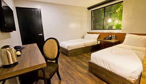 Habitación superior con 2 camas individuales