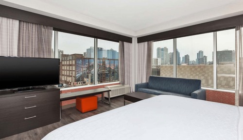 Suite, 1 cama de matrimonio grande, vistas a la ciudad