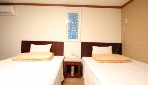 Habitación con 2 camas individuales