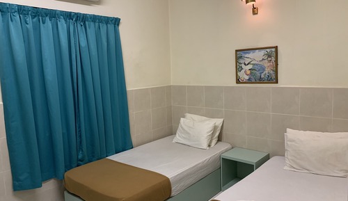 Habitación con 2 camas individuales