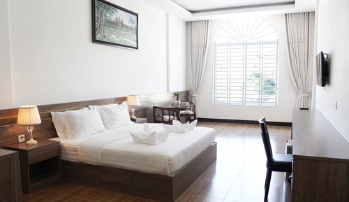 Habitación cuádruple ejecutiva