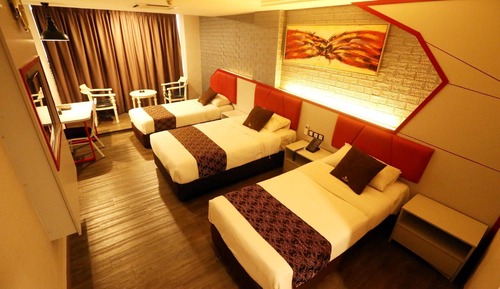 Habitación triple Deluxe