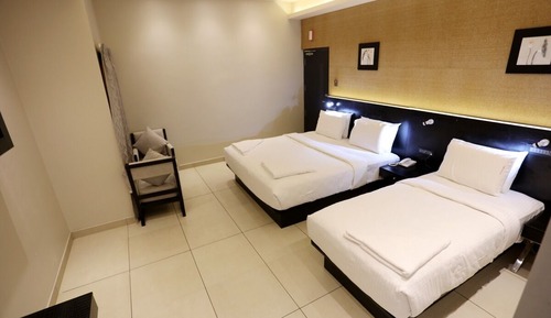 Habitación triple Deluxe