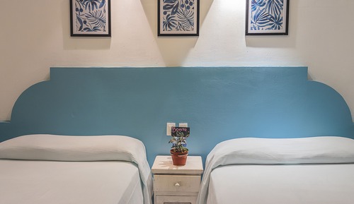 Habitación cuádruple familiar, vistas al jardín