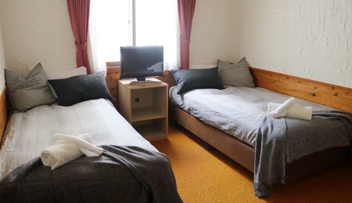 Habitación con 2 camas individuales