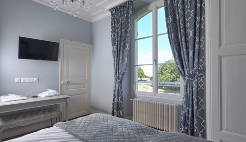 Habitación panorámica con 1 cama doble o 2 individuales, vistas al jardín
