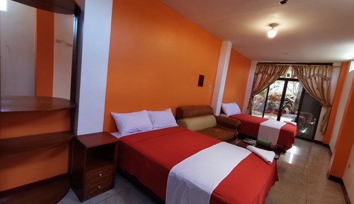 Habitación familiar, varias camas