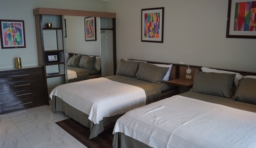 Habitación individual Deluxe, 2 camas de matrimonio