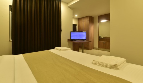 Habitación triple Deluxe