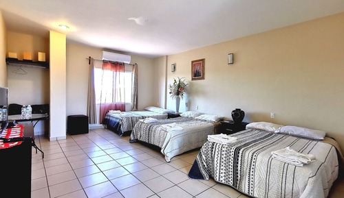 Habitación triple (Room 6)