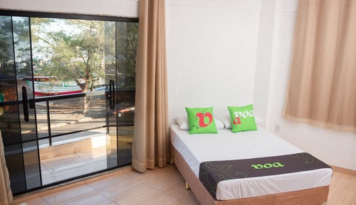 Habitación superior con 2 camas individuales, balcón
