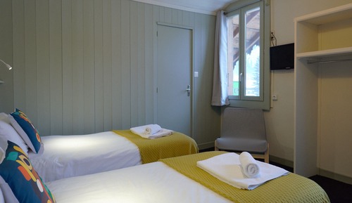Habitación superior con 1 cama doble o 2 individuales