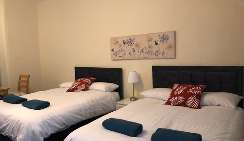 Habitación cuádruple estándar, varias camas
