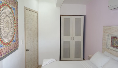 Suite familiar, vistas parciales al mar