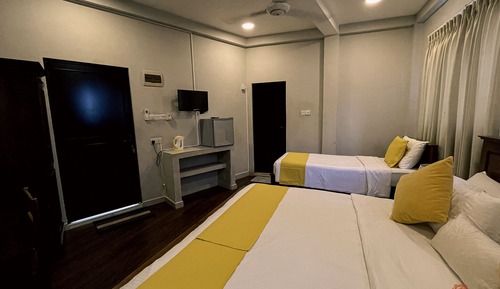 Habitación triple Deluxe, frigorífico