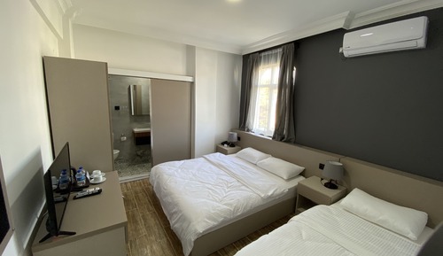 Habitación triple Deluxe