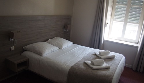 Habitación Confort con 1 cama doble o 2 individuales