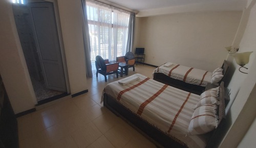 Habitación con 2 camas individuales