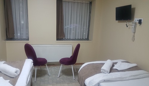 Habitación con 2 camas individuales
