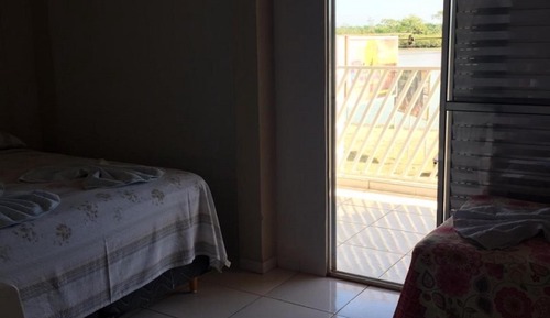 Habitación triple, varias camas
