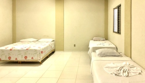 Habitación cuádruple, varias camas