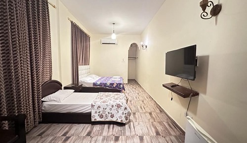 Habitación familiar con 1 cama doble o 2 individuales