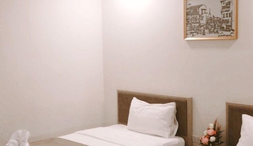 Habitación básica con 2 camas individuales