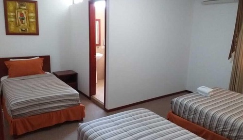 Habitación triple tradicional, dormitorio mixto
